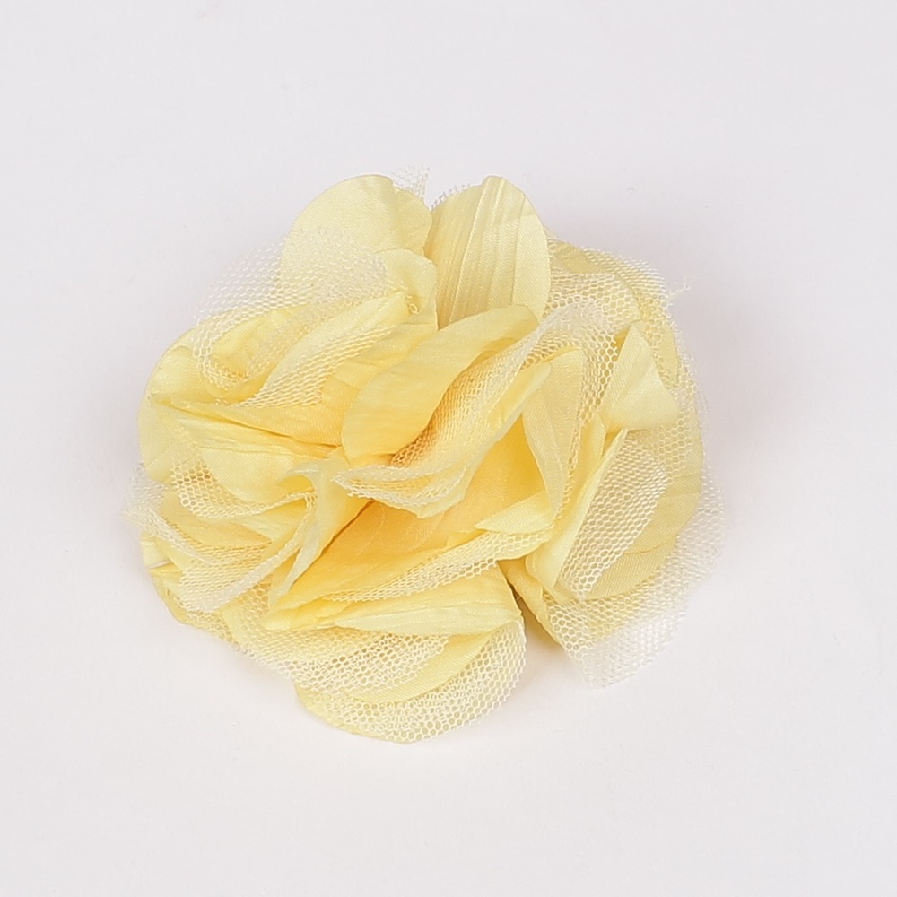 Жълто малко декоративно цвете