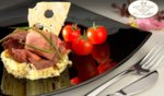 Патешко магре с картофено пюре, трюфели и чери домати