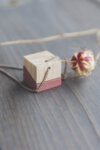 BLUE CONCRETE CUBE NECKLACE