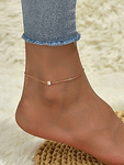Нежна гривна за крак с камъче розово злато