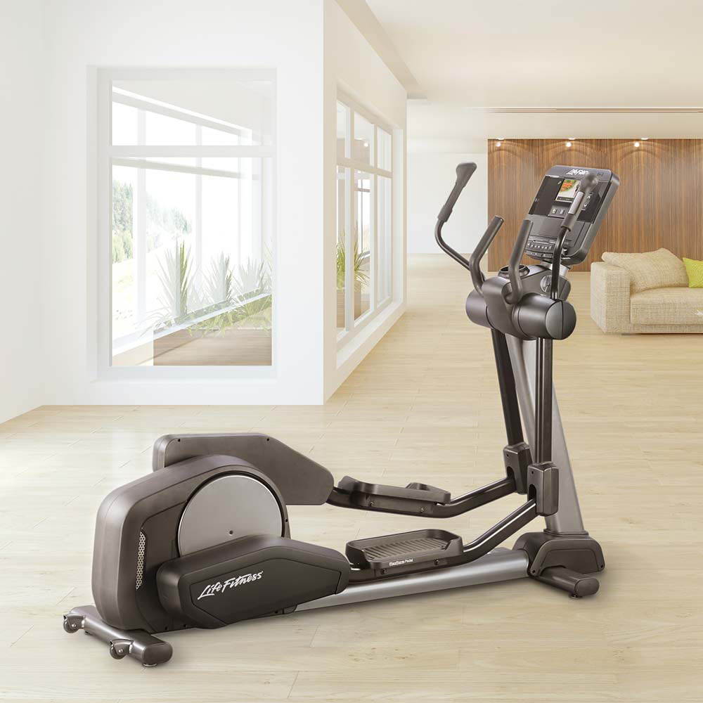 Кростренажор Club Series+ Elliptical | LifeFitness - lifefitness.bg 1 Club Series+ Elliptical with X console in living room of home