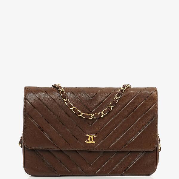Chanel diagonal quilted flap bag hotsell