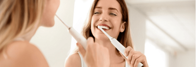 Техника на почистване на зъбите с електрическа четка за зъби